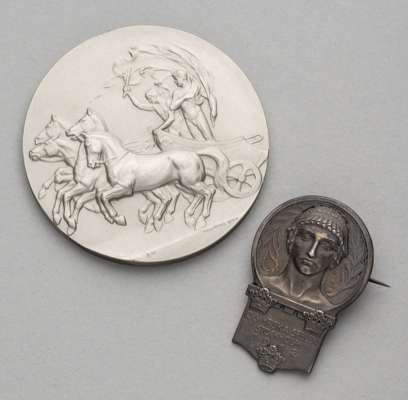 Stockholm 1912 Olympic Games pewter participation medal with an official's/participant's entrance badge,
 obverse featuring a quadriga with a triumpha
