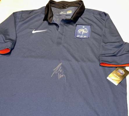 France: Hugo Lloris, captain, signed France World Cup blue shirt,
 signed with silver sharpie on front of shirt. Brand new with tags attached. Size 2X