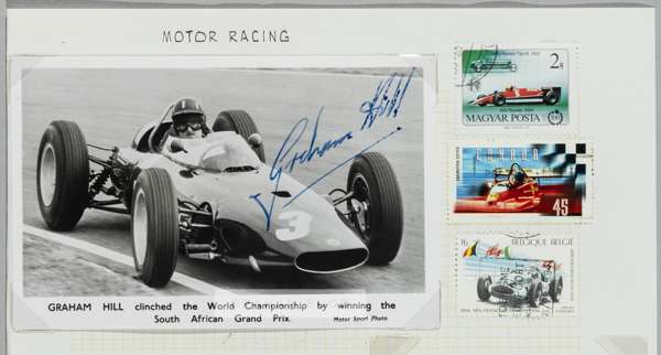 Superb signed b&w photographic card of Graham Hill winning the South African Grand Prix clinching the World championship in 1962,
 signed in blue pen 