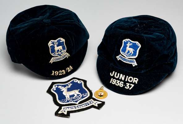 A group of memorabilia relating to Watford Association FC and the Herts County F.A.,
 comprising a 9ct gold and enamel medal issued by Watford AFC, un