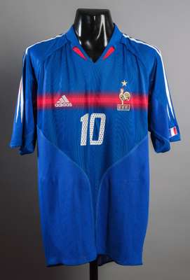 Zinedine Zidane signed replica of a France Euro 2004 jersey, the blue shirt signed to the reverse beside the No.10