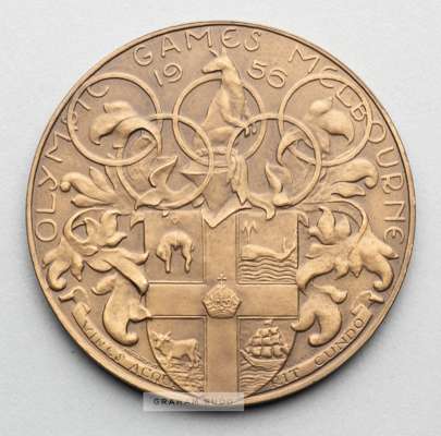 Melbourne 1956 Olympic Games participant's medal,
 designed by A. Meszaros, bronze, obverse with the Olympic Motto within a circle of athletes marchin