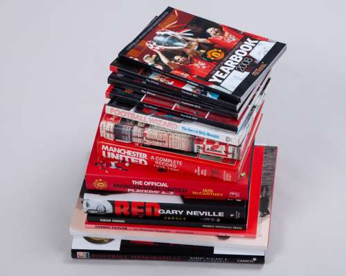 A collection of Manchester United Review Collectors Club booklets