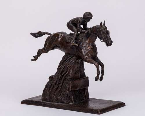Bronze of a steeplechaser jumping a fence
