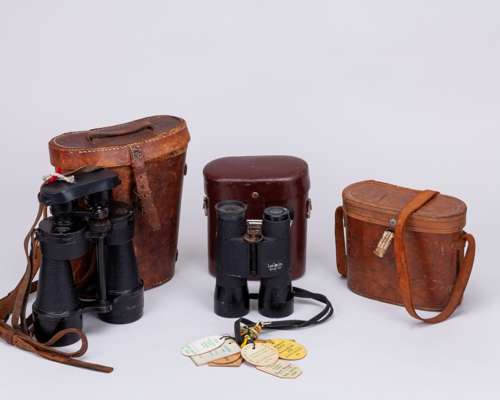 Two vintage racing binoculars