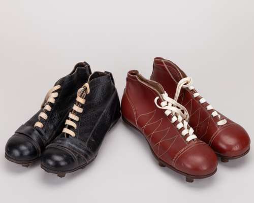 Two pairs of vintage leather football boots