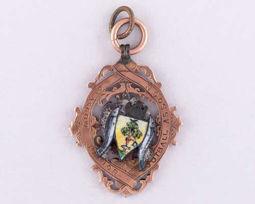 M McCafferty 9ct gold and enamel Glasgow Junior Cup winners medal 1896-97