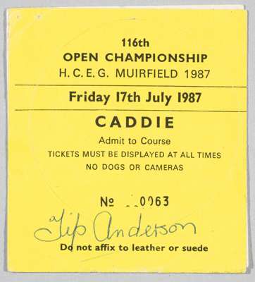 Tip Anderson and Arnold Palmer signed Muirfield 1987 Open Championship golfer's caddie's badge,
 the yellow sticker badge printed 116TH OPEN CHAMPIONS