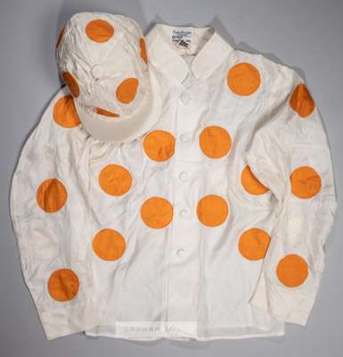 A set of Sethia London Ltd race-worn silks circa early 1980s,
 the ivory coloured silks with applied orange dots, bearing makers neck label for Lester