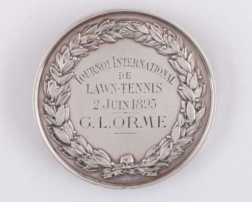 A white-metal Societe de Sport De L'Ile de Puteaux Lawn Tennis medal