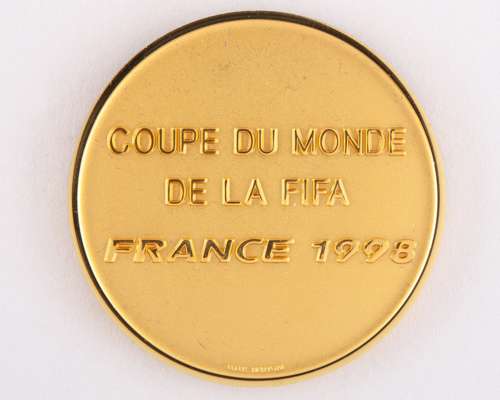 David Will - yellow-metal FIFA 1998 World Cup medal, designed by Bertoni