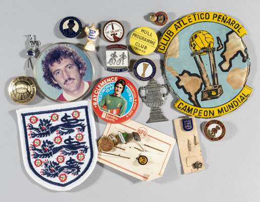 A collection of football badges,
 mostly metal & enamel, also cloth including and England three lions, pin buttons, good selection of supporters' club
