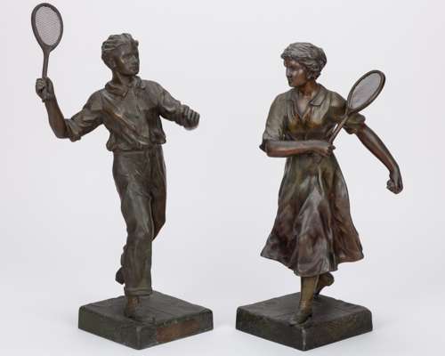 A pair of matched, very detailed possibly from the 1920s showing a male and female player