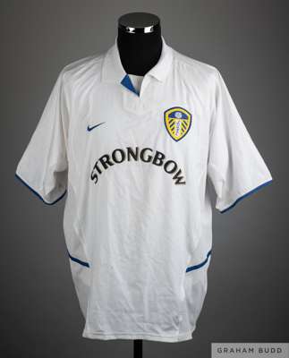 Mark Viduka white No.9 match worn Leeds United short-sleeved shirt, 
 Dual Layer Nike, XL, with v-neck style collar and embroidered cloth badge inscri