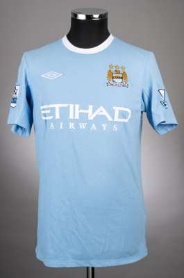 Carlos Tevez sky-blue and white No.32 Manchester City short-sleeved jersey, 2009-10, 
 Umbro, 38, with crew-neck collar and embroidered badge inscribe