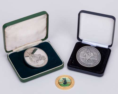 Two cased silver medallions commemorating the steeplechasers Arkle and L'Escargot