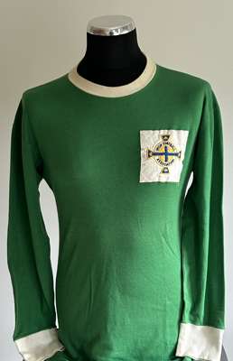 George Best green and white No.7 Northern Ireland match worn long-sleeved shirt, 1965
