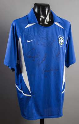 Brazil 2002 style blue away 5-star jersey signed by the Japan/South Korea World Cup winners Ronaldo, Ronaldinho, Rivaldo & Roberto Carlos and addition