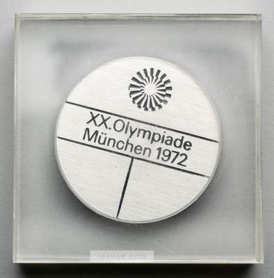 Munich 1972 Olympic Games participant's medal,
 designed by F. Konig, steel, obverse with Munich Olympic Games emblem of a wreath of rays of superimpo