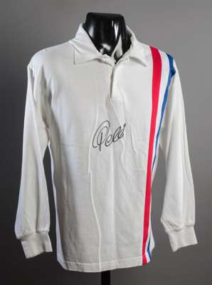Pele signed 'Escape To Victory'' jersey, signed in black marker pen; sold together with a Pele signed scale repro of the Escape To Victory movie poste