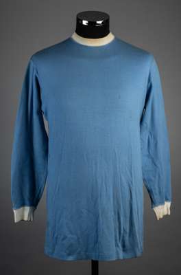 Sky blue Manchester City no.13 substitutes jersey, late 1960s,
 Umbro, long-sleeved with white crew neck collar and cuffs, numbered to reverse, bearin