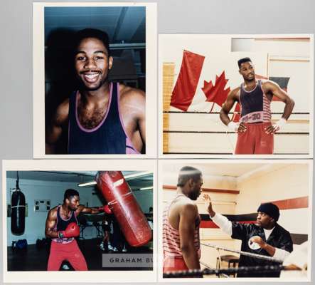 Boxing colour photographs of Lennox Lewis training for the fight against Greg Gorrell on 18th December 1989,
 10 by 8in. training photographs containe