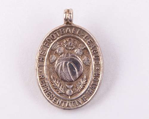 Silver Football League representative medal awarded to Andy Malcolm of West Ham United, 1958