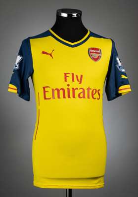 Lukas Podolski yellow and navy Arsenal no.9 away jersey, season 2014-15,
 match issue, Puma, short-sleeved with BARCLAYS PREMIER LEAGUE sleeve badge, 