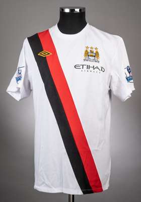 Ryan McGivern Manchester City no.50 away jersey white with red and black diagonal stripe from the 2009-10 Premiership season,
 Player issued short sle
