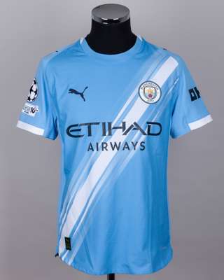 Rico Lewis blue No.82 Manchester City v. Napoli match worn short-sleeved shirt, 2025