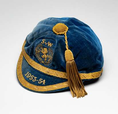 Scotland international cap awarded to Lawrie Reilly for the match v Wales played at Hampden Park 4th November 1953,
 blue velvet cap with gilt tassel 