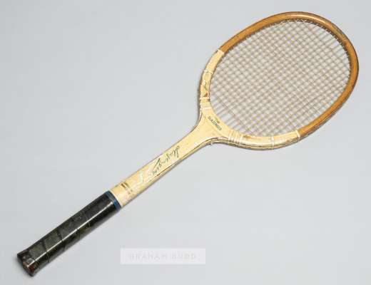 British champion Freda James' white Slazenger's laminated tennis racquet, circa 1933,
 FJ initials stamped on the wedge, the finishing varnish is heav