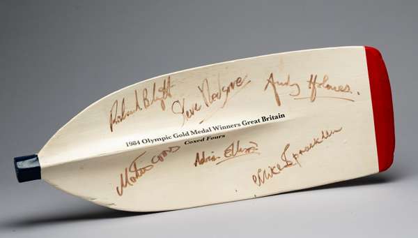 Great Britain Coxed Four Los Angeles 1984 Olympic Games gold medal winners signed rowing blade,
 cream, red and black blade head signed in marker pen 