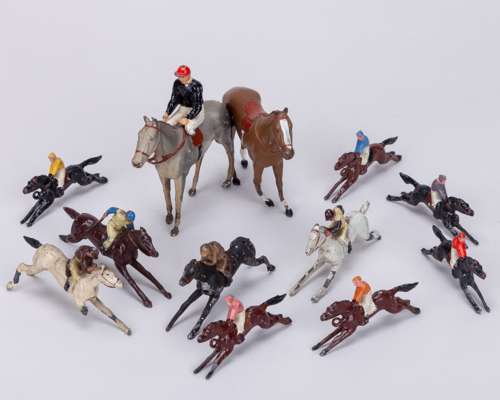 A group of horse racing lead figures