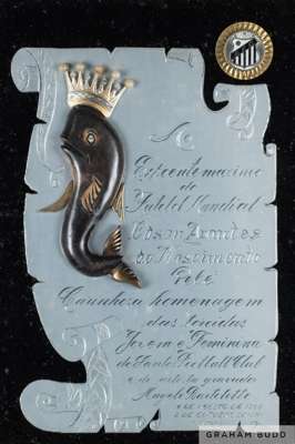 A framed metal plaque presented to Pelé on October 2, 1974, for (translated) "A tribute to the world's greatest football player and his Brazilian care