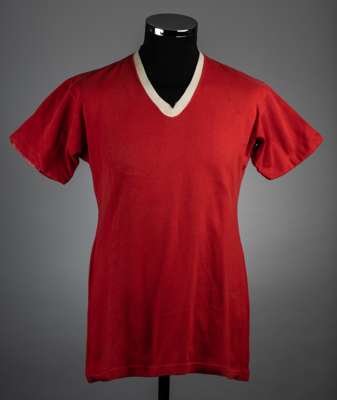 Bobby Charlton red No.10 Manchester United v. Real Madrid match worn short-sleeved jersey, 
 Umbro collar labels, with v-neck collar

  Some discolour