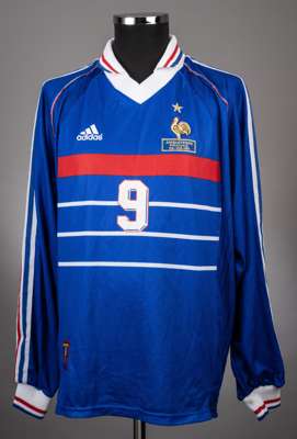 Lilian Leslandes blue Adidas France no.9 home jersey from the friendly game v England 10/2/99 at Wembley Stadium,  
 the jersey is a long sleeved Adid
