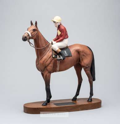 Beswick china Connoisseur model of the triple Grand National winner Red Rum with jockey Brian Fletcher up,
 model number 2511, on wooden plinth, heigh