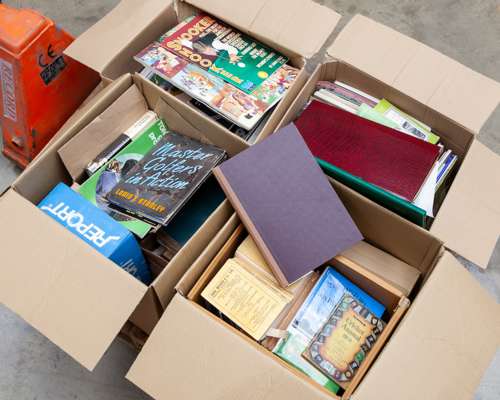 Four large boxes of cricket and other sports books and assorted ephemera