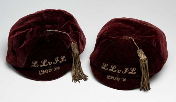A pair of football representative caps dated 1908-09 and 1909-10,
 maroon velvet caps by H J Wilson of Hamilton, both inscribed in LL v IL with wirewo