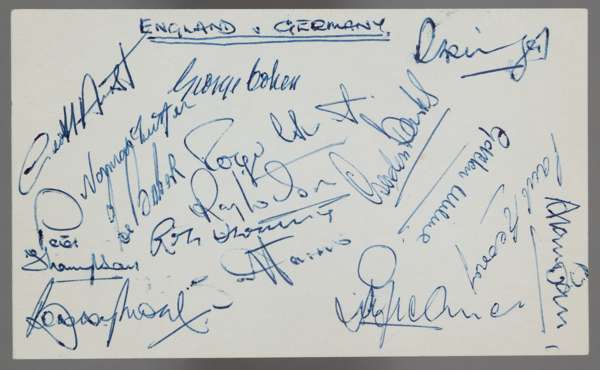 ENGLAND v GERMANY 23rd FEB 1966 ENGLAND TEAM AUTOGRAPHED POSTCARD INC BOBBY MOORE, JIMMY GREAVES, GORDON BANKS  

England defeated West Germany 1-0 in