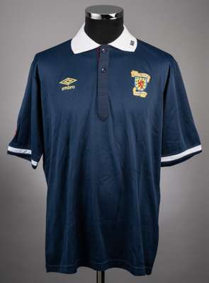 Ally McCoist blue No.9 Scotland v. Poland International short-sleeved jersey, 
 Umbro, L, with button-up collar and embroidered badge inscribed THE SC