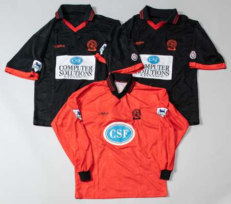 Three Queen's Park Rangers away match jerseys,
 comprising an Andy Impey red and black Premier League no.7 jersey; a Devon White black and red Premier