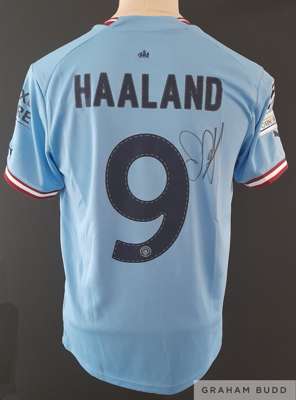 Erling Haaland signed Manchester City 2022-23 Champions League shirt, 
 which is brand new with tags still attached. Haaland signed whilst coming out 