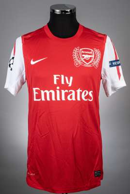Yossi Benayoun red Arsenal home jersey from the 2011-12 Champions League Campaign.
 Player issued short sleeved example with the UEFA RESPECT badge on