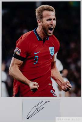 Framed photographic display signed by England's record goal scorer Harry Kane,
 14 by 12in. colour goal celebration photograph, mounted over a signatu
