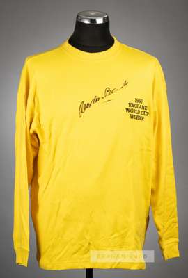Gordon Banks signed yellow 1966 England World Cup Winners retro goalkeeper's jersey,
 signed in black marker pen on front, with Sporting Legends COA, 