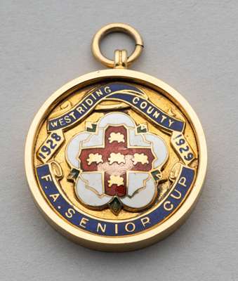 9ct gold & enamel West Riding County FA Senior Cup winner medal awarded to Fred MacLachlan of Halifax Town in season 1928-29, 
 inscribed with competi
