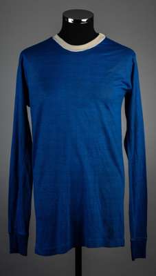 Blue Everton no.5 jersey, late 1960s,
 Bukta, long-sleeved, white crew neck collar, reverse numbered 

 Collar somewhat discoloured, otherwise good