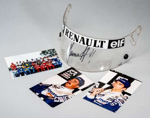 Damon Hill signed Elf Renault visor and a group of photographs from the Australian Grand Prix in Adelaide, 13th November 1994,
 the clear visor applie